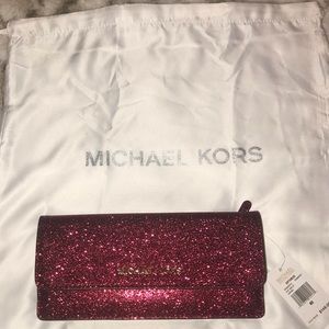 MK cranberry shimmer flat wallet
